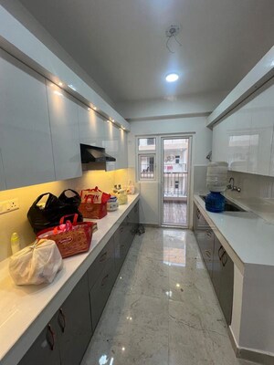 Kitchen in 4 BHK Apartment at Raj Nagar Extension – for Rent