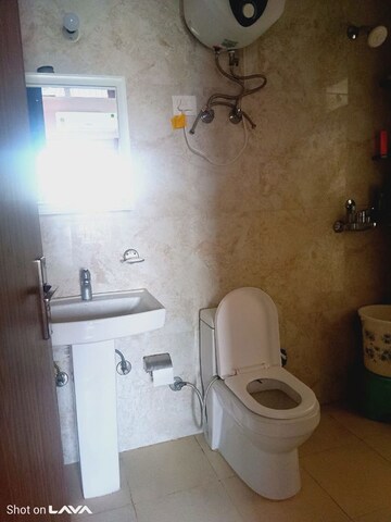 Bathroom in 2 BHK Apartment at Ace Divino, Sector 1 Greater Noida – for Rent