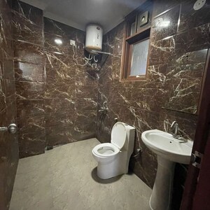 Bathroom in 3 BHK Builder Floor at Chattarpur – for Rent