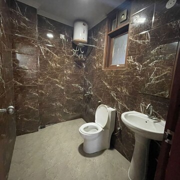 Bathroom in 3 BHK Builder Floor at Chattarpur – for Rent