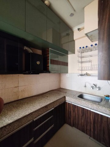 Kitchen in 2 BHK Apartment at Amrapali Enchante, Tech Zone 4 Greater Noida – for Sale