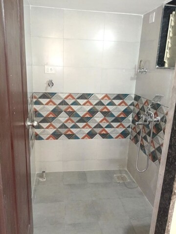 Bathroom in 1 BHK Apartment at Raajlaxmi Tower, Vasai East – for Rent