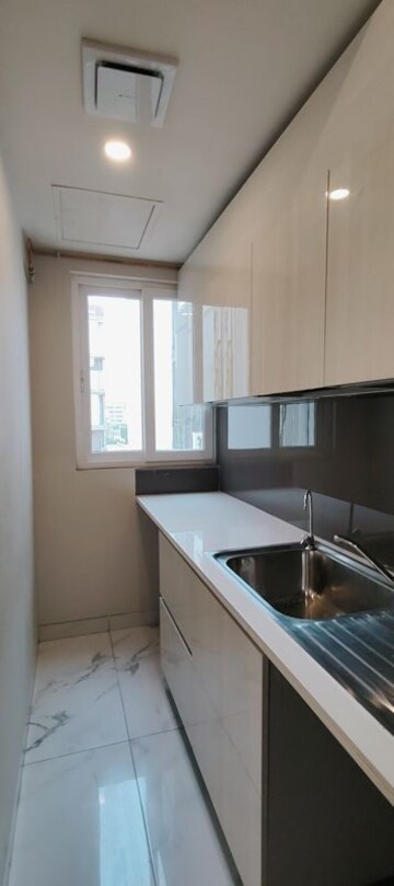 Kitchen in 2.5 BHK Builder Floor at Central Park Flower Valley, Sohna Sector 33 – for Rent