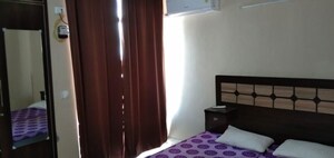 Bedroom in 4 BHK Apartment at Ansals Celebrity Greens, Sushant Golf City – for Rent