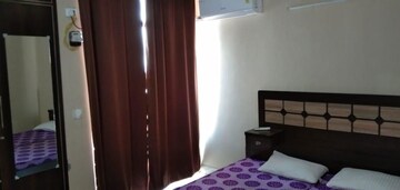 Bedroom in 4 BHK Apartment at Ansals Celebrity Greens, Sushant Golf City – for Rent