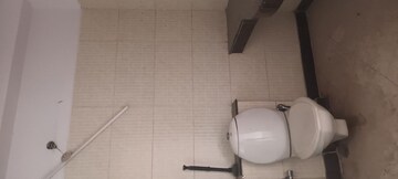 Bathroom in 3 BHK Apartment at Ramprastha Greens – for Sale