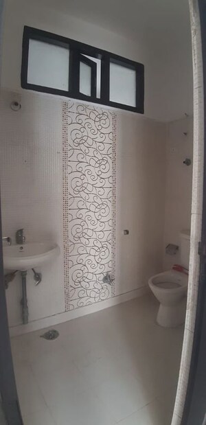Bathroom in 3 BHK Apartment at Ramprastha Pearl Court, Vaishali Sector 7 – for Sale