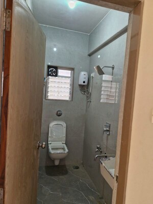 Bathroom in 2 BHK Apartment at Vasundhara Geetanjali Paradise, Malad West – for Rent