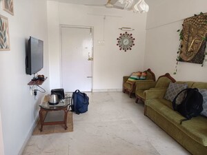 Living Room in 1 BHK Apartment at Savita Chhaya CHS, Bandra West – for Rent
