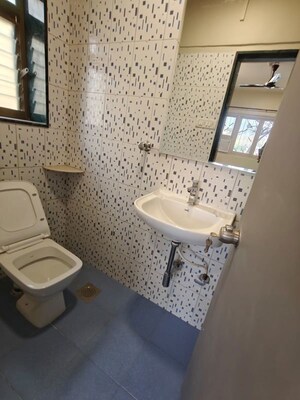 Bathroom in 2 BHK Apartment at Rameshwar CHS Santacruz, Santacruz West – for Rent