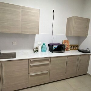 Kitchen in 2 BHK Apartment at Bhartiya Nikoo Homes, Kannur – for Rent