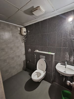 Bathroom in 1 BHK Apartment at Lodha Lakeshore Greens, Dombivli East – for Rent