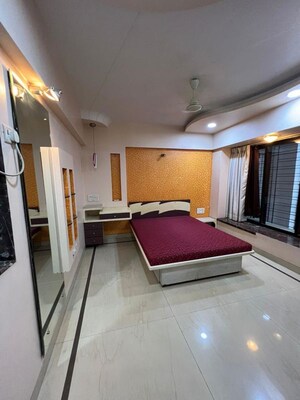 Living Room in 2 BHK Apartment at Satellite Tower, Goregaon East – for Rent
