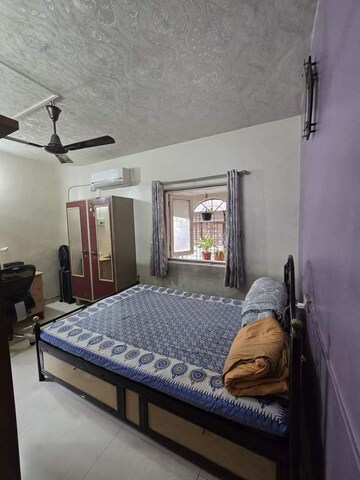 Bedroom in 2 BHK Apartment at Samruddhi Apartments, Camp – for Sale