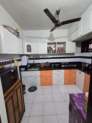 Kitchen in 2 BHK Apartment at Samruddhi Apartments, Camp – for Sale