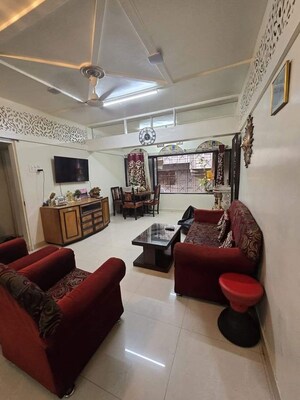 Living Room in 2 BHK Apartment at Samruddhi Apartments, Camp – for Sale