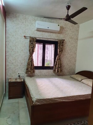Bedroom in 1 BHK Apartment at Satellite Garden, Goregaon East – for Rent