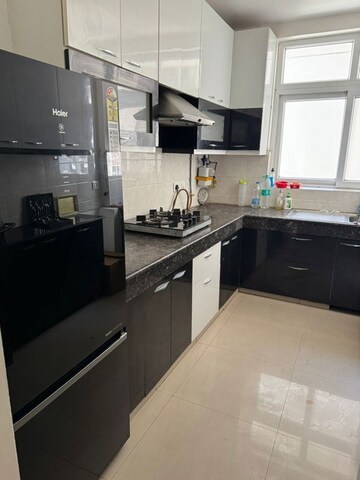 Kitchen in 3 BHK Apartment at 3C Lotus 300, Sector 107 – for Sale