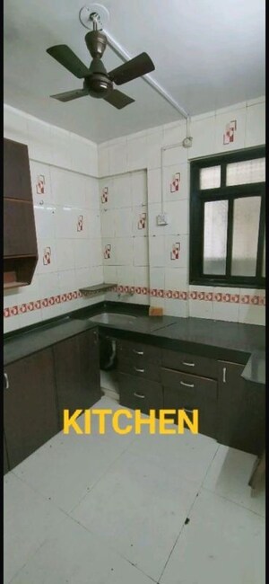 Kitchen in 2 BHK Apartment at Mayfair Complex, Camp – for Sale