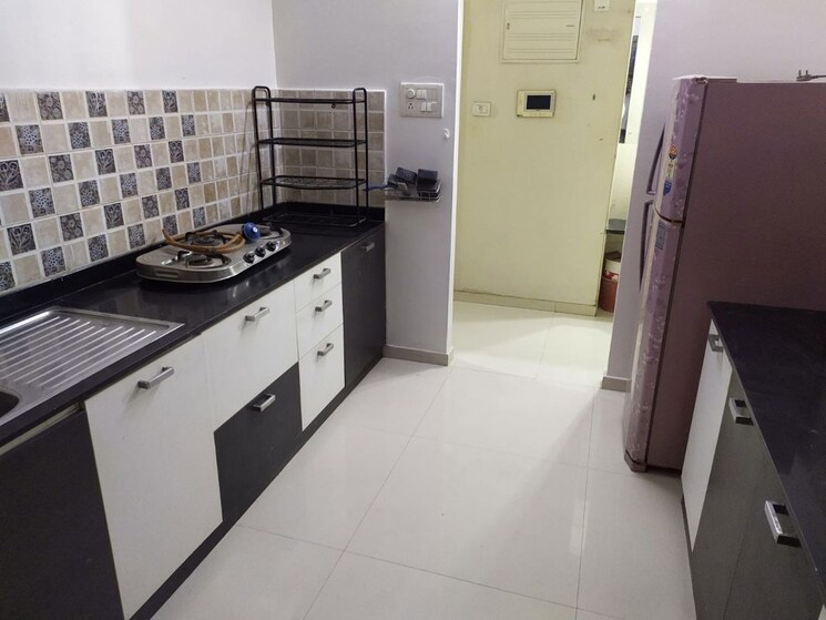 Kitchen, aloma-aquena-towers 2 Bedroom 1181 Sq.Ft. Apartment In Aundh Pune 9909444