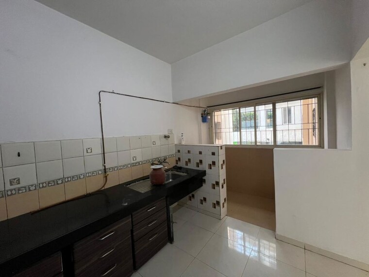 Kitchen, mohan nagar co op society 2 Bedroom 1000 Sq.Ft. Apartment In Mohan Nagar Co Op Society Pune 9909880