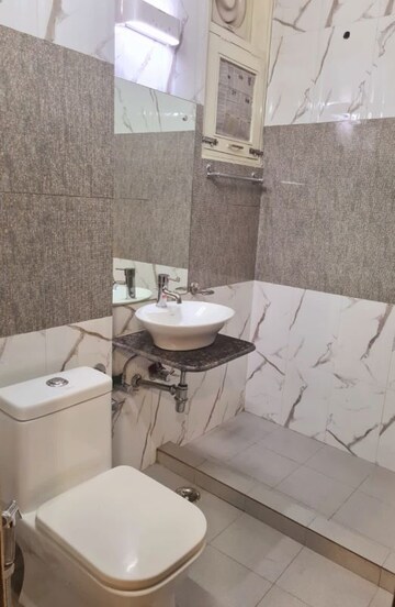 Bathroom in 3 BHK Apartment at Sukhdev Vihar – for Sale