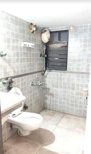 Bathroom in 3 BHK Apartment at Atul Blue Orbit, Malad West – for Rent