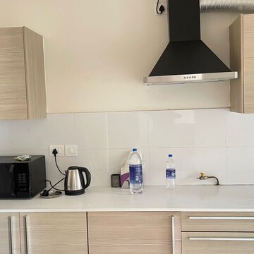 Kitchen in 2.5 BHK Apartment at Bhartiya Nikoo Homes, Kannur – for Rent