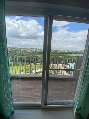 Balcony in 3 BHK Apartment at Capstone Life Flowing Tree, Allalasandra – for Rent