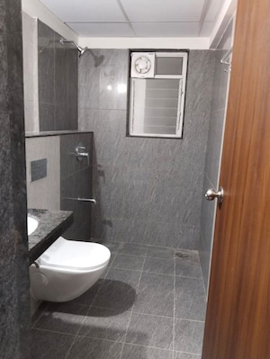 Bathroom in Studio Apartment at Gera World of Joy, Kharadi – for Sale