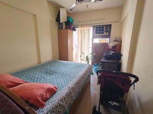 Bedroom in 2.5 BHK Apartment at Eco Elegance, Andheri East – for Rent