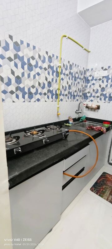 Kitchen in 1 BHK Apartment at Raunak Bliss, Ghodbunder Road – for Rent