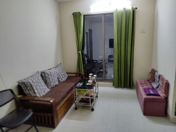 Living Room in 2 BHK Apartment at Bhatia Esspee Towers, Borivali East – for Rent