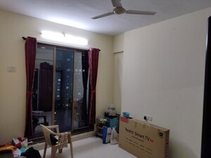 Living Room in 2 BHK Apartment at Bhatia Esspee Towers, Borivali East – for Rent