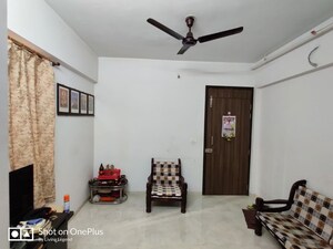 Living Room in 1 BHK Apartment at Lodha Palava City, Dombivli East – for Sale