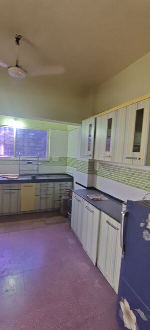 Kitchen in 2 BHK Apartment at Dinesh Apartment, Shivajinagar – for Rent