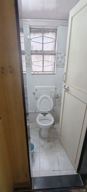 Bathroom in 2 BHK Apartment at Dinesh Apartment, Shivajinagar – for Rent