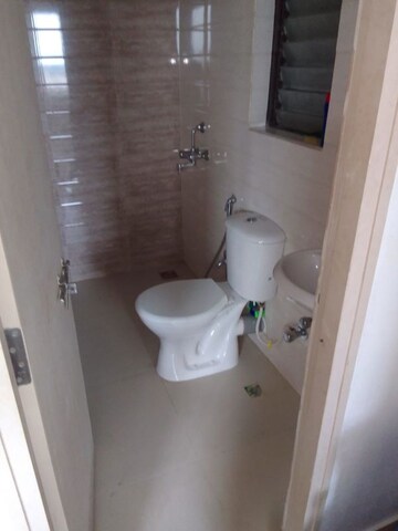 Bathroom in 1 BHK Apartment at Ambuja Utalika : The Condoville, Em Bypass – for Sale