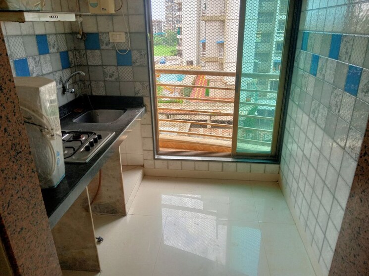 Kitchen, paradise-sai-riverdale 1 Bedroom 650 Sq.Ft. Apartment In Taloja Navi Mumbai 9910784