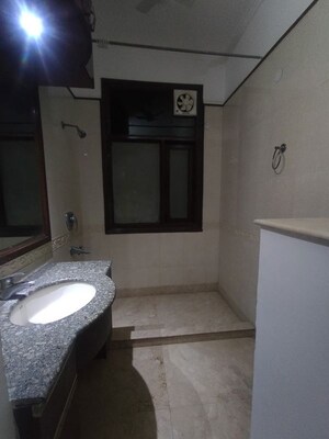 Bathroom in 3 BHK Apartment at Defence Colony – for Rent