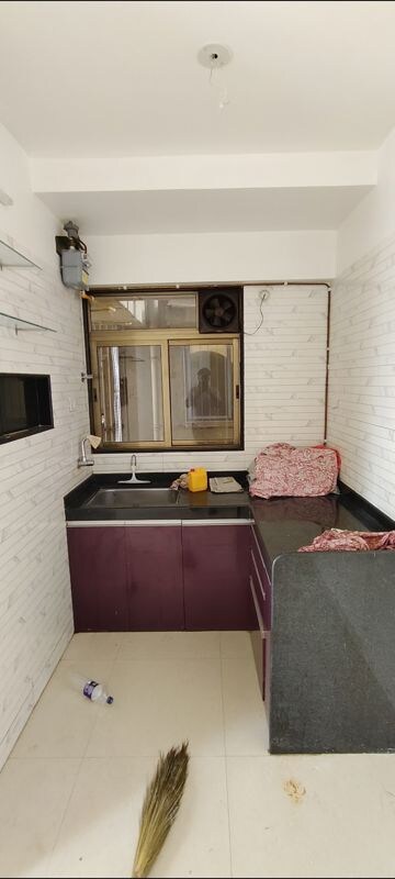 Kitchen in 1 BHK Apartment at Chandak Nishchay Wing E, Borivali East – for Rent