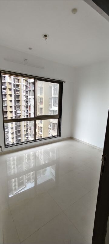 Room in 1 BHK Apartment at Chandak Nishchay Wing E, Borivali East – for Rent