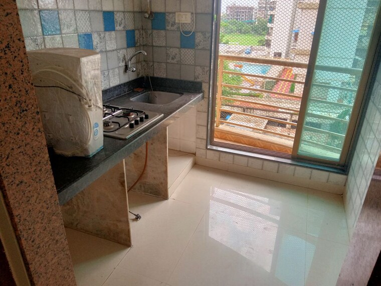 Kitchen, paradise-sai-riverdale 1 Bedroom 700 Sq.Ft. Apartment In Taloja Navi Mumbai 9910841