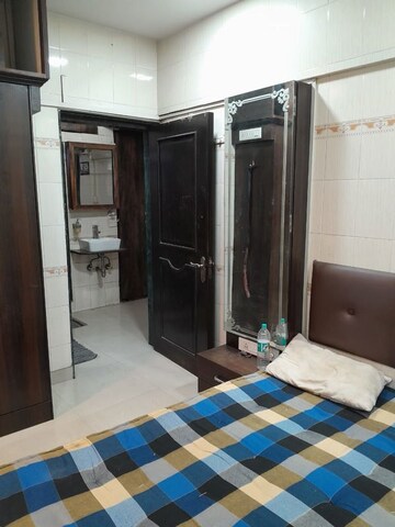 Living Room in 1 BHK Apartment at Borivali East – for Rent