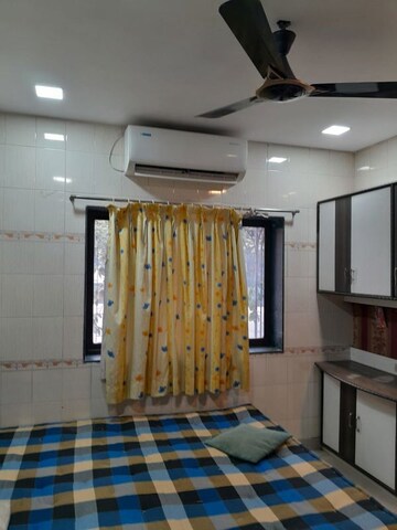 Living Room in 1 BHK Apartment at Borivali East – for Rent