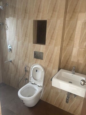 Bathroom in 3 BHK Apartment at T Bhimjyani Neelkanth Woods, Manpada – for Rent