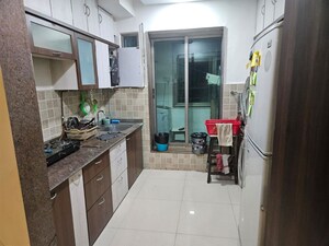 Kitchen in 3 BHK Apartment at T Bhimjyani Neelkanth Woods, Manpada – for Rent