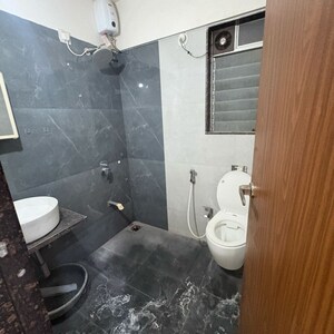 Bathroom in 2.5 BHK Apartment at Varad Heights, Tilak Nagar – for Rent
