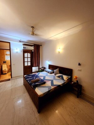 Living Room in 4 BHK Apartment at Vasant Vihar – for Rent