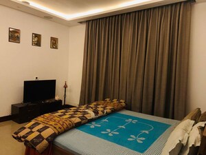 Bedroom in 4 BHK Builder Floor at Green Fields Colony – for Sale